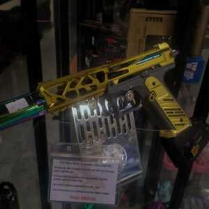 a custom built airsoft AAP-01 by CTM TAC on a display case